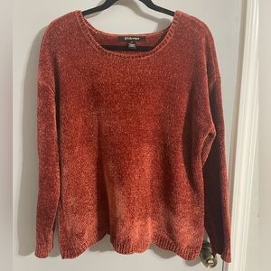 Soft chenille rust colored sweater with scalloped edge bottom